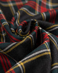 Dark multicolored falling pure wool tartan. High-quality deadstock fabric collected in Stock from a Maison de Couture in Italy.