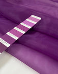 Purple polyester organza very soft, light, and transparent a little shiny. High-quality deadstock fabric collected in Stock from a Maison de Couture in Italy.