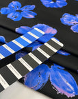 Pure cotton poplin with elastane, black base with floral print in shades of blue and pink. Very soft and not transparent. High-quality deadstock collected in Stock from a Maison de Couture in Italy. 