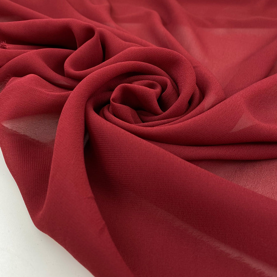 Pure viscose in georgette bordeaux is very soft, transparent and flowy. High-quality deadstock fabric by the meter collected in Stock from a Maison de Couture in Italy.