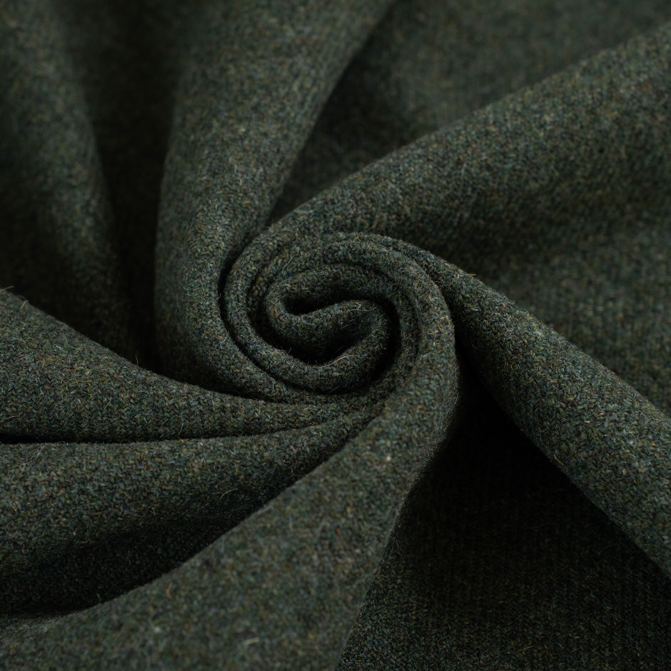 Green pure soft and spongy wool fabric. High quality deadstock fabric.