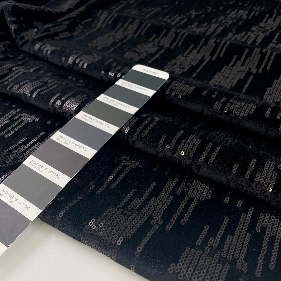 Stretch polyester chenille with shiny paillettes and geometric design soft light and fluid ideal for bold eveningwear. High-quality deadstock collected in Stock from a Maison de Couture in Italy.