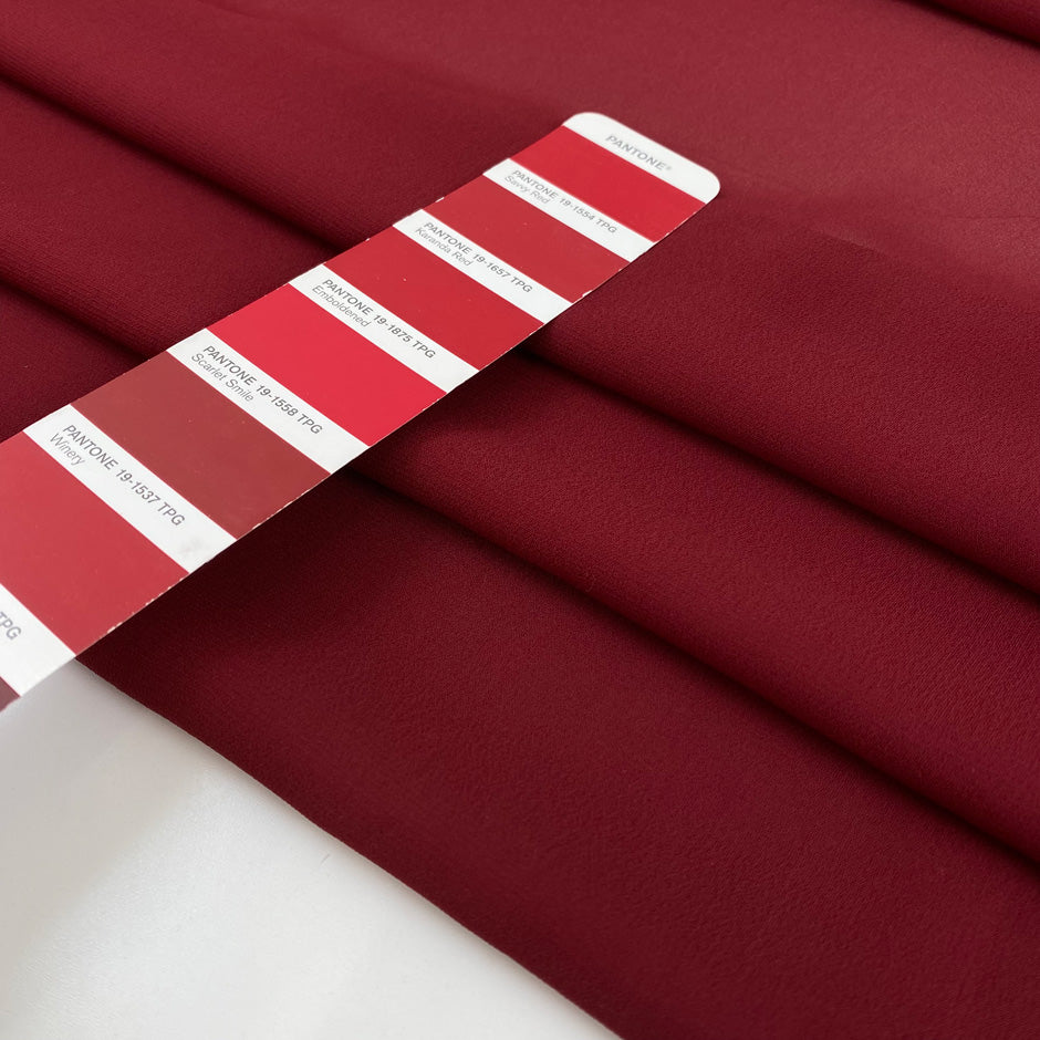 Pure viscose in georgette bordeaux is very soft, transparent and flowy. High-quality deadstock fabric by the meter collected in Stock from a Maison de Couture in Italy.