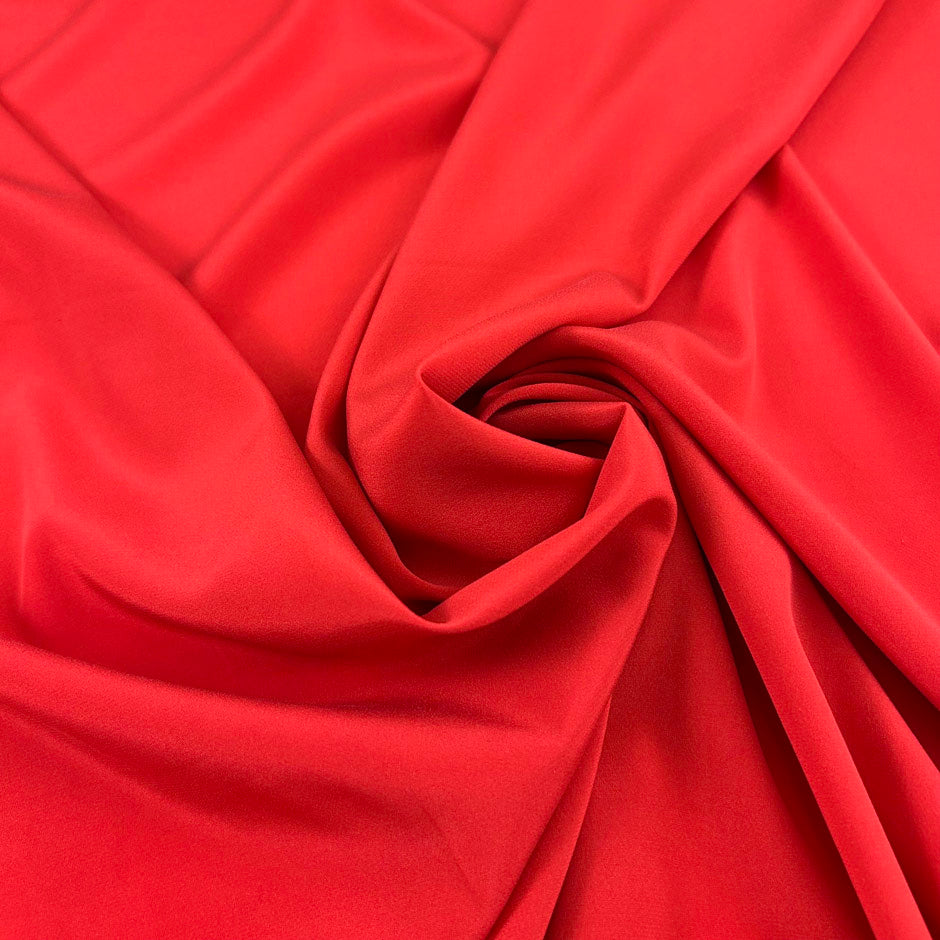 Red pure silk crepe de chine, soft, fluid and stretchy. High-quality deadstock collected in Stock from a Maison de Couture in Italy.