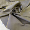 Mixed cotton and polyester denim with diagonal texture in a blend of sage green and bright blue. Medium weight, ideal for trench coats and jackets. High-quality deadstock collected in Stock from a Maison de Couture in Italy.