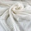 Pure silk chiffon in star white with golden lurex stripes. Very light, soft, flowy, and transparent. Ideal for dresses, skirts, blouses, and shirting. High-quality deadstock collected in Stock from a Maison de Couture in Italy.