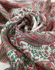 Pure silk with paisley design in panels in white, green, and pink shades. Very soft and light. High-quality deadstock fabric collected in Stock from a Maison de Couture in Italy.