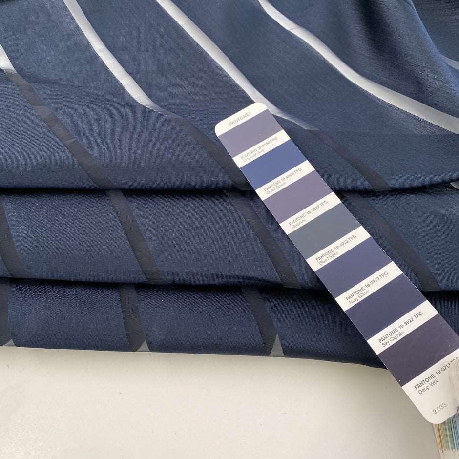 Blue silk and polyester organza with stripes. High-quality deadstock fabric collected in Stock from a Maison de Couture in Italy.