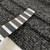 Tweed in polyester wool and viscose blend in smoked pearl grey. Very soft, light, warm and flowy. Ideal for winter dresses, jackets, skirts and light coats. High-quality deadstock collected in Stock from a Maison de Couture in Italy.