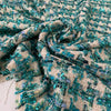 Soft cotton and lurex tweed with an ivory base and turquoise lurex accents in a pied de poule texture. Ideal for jackets, light coats, skirts, and dresses.High-quality deadstock collected in Stock from a Maison de Couture in Italy.