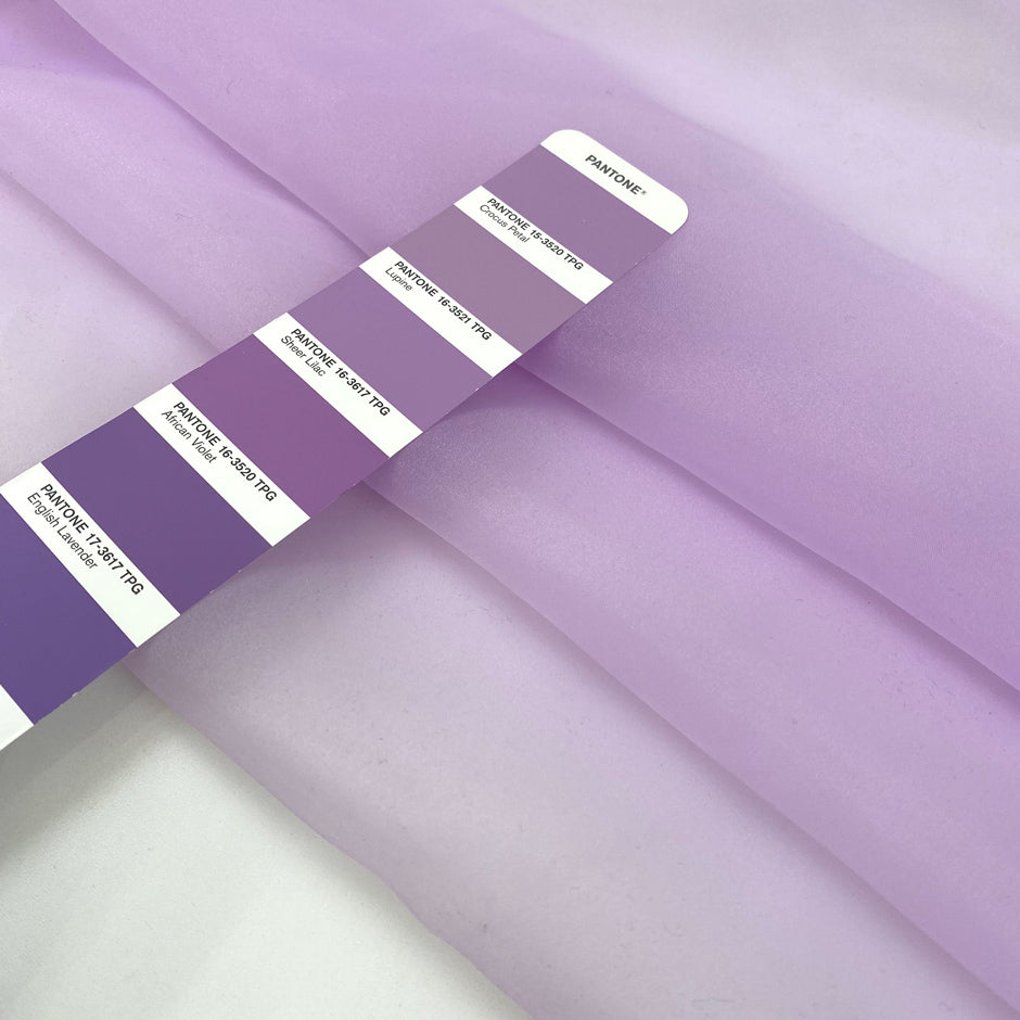 Lilac polyester organza very light and transparent, soft and flowy. High-quality deadstock fabric collected in Stock from a Maison de Couture in Italy.