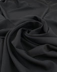 Light cady in black polyester very soft and light. High-quality deadstock fabric collected in Stock from a Maison de Couture in Italy.