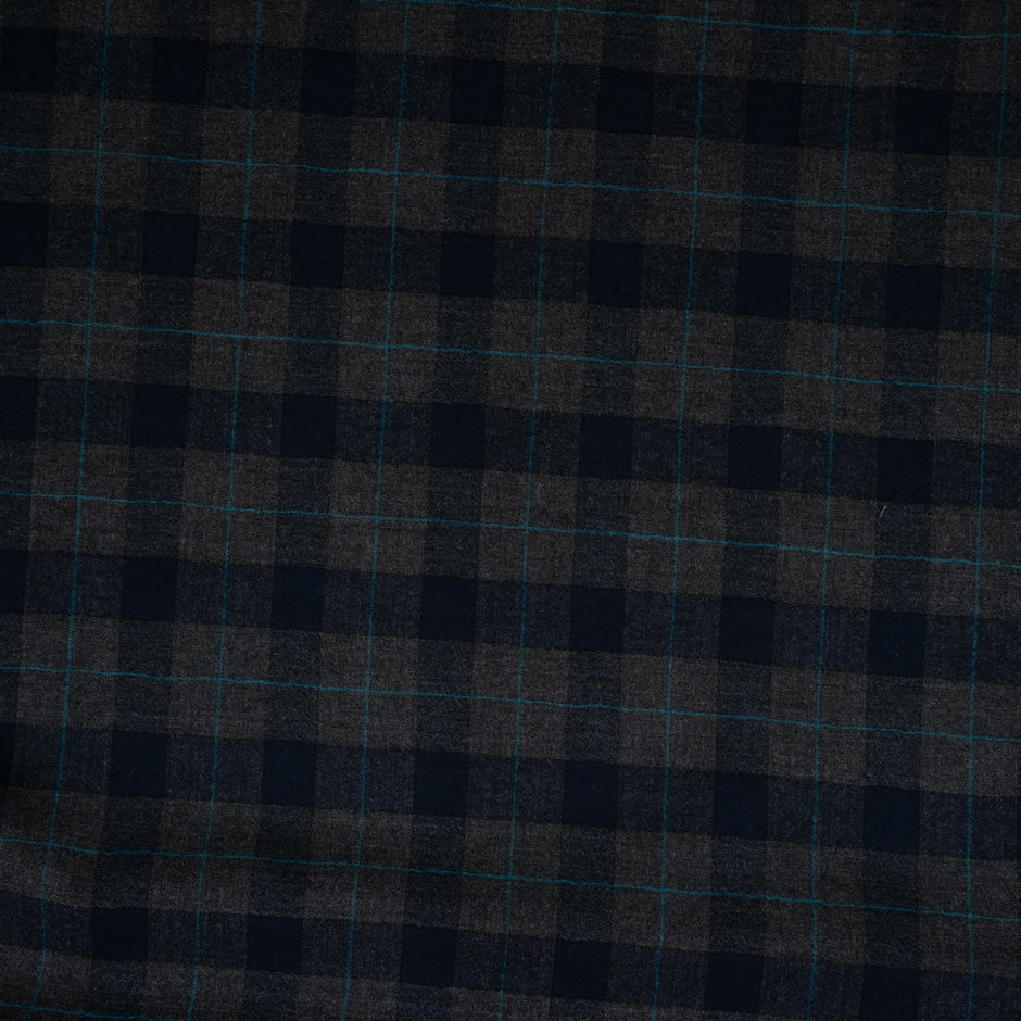 Blue and gray square flannel in pure virgin wool. High-quality deadstock fabric by the meter collected in Stock from a Maison de Couture in Italy.