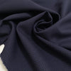 Pure virgin wool in dark blue with a tiny pied de poule pattern. Slightly stiff, perfect for structured jackets and skirts.High-quality deadstock collected in Stock from a Maison de Couture in Italy.