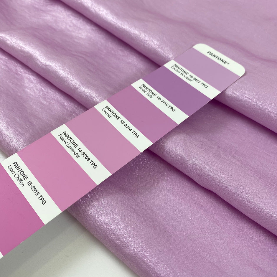Viscose and polyester light cady, very shiny in orchid violet. Very soft and flowy. High-quality deadstock fabric by the meter collected in Stock from a Maison de Couture in Italy.