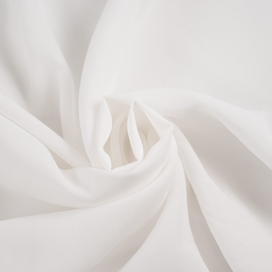 White sctructured viscose crepe de chine. High quality deadstock fabric.