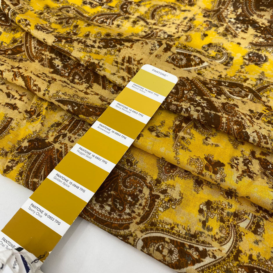 Very soft and light viscose muslin with a paisley design in mustard and brown. Flowy and not transparent, ideal for scarves, light shirting, and airy dresses. High-quality deadstock collected in Stock from a Maison de Couture in Italy.