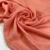 Pure viscose in peach color, very soft and light, flowy. Ideal for shirts, blouses, dresses, and skirts. High-quality deadstock fabric by the meter collected in Stock from a Maison de Couture in Italy