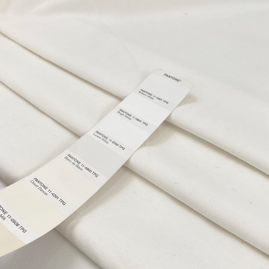 Heavy white cotton with slight stretch, very soft and warm to the touch, ideal for hoodies, jackets, trousers, and structured garments. High-quality deadstock collected in Stock from a Maison de Couture in Italy.