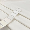 Heavy white cotton with slight stretch, very soft and warm to the touch, ideal for hoodies, jackets, trousers, and structured garments. High-quality deadstock collected in Stock from a Maison de Couture in Italy.