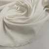 Pure white cotton jersey, stretchy and semi-trasparent. High quality deadstock fabric.