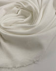 Pure white cotton jersey, stretchy and semi-trasparent. High quality deadstock fabric.