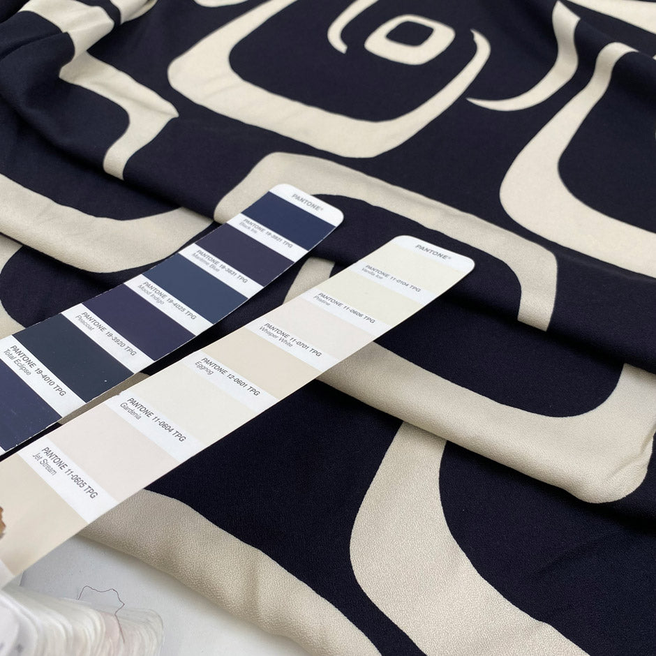 Pure viscose crepe in dark blue and beige shades, with a very big geometrical design. Very soft and light. High-quality deadstock fabric by the meter collected in Stock from a Maison de Couture in Italy.