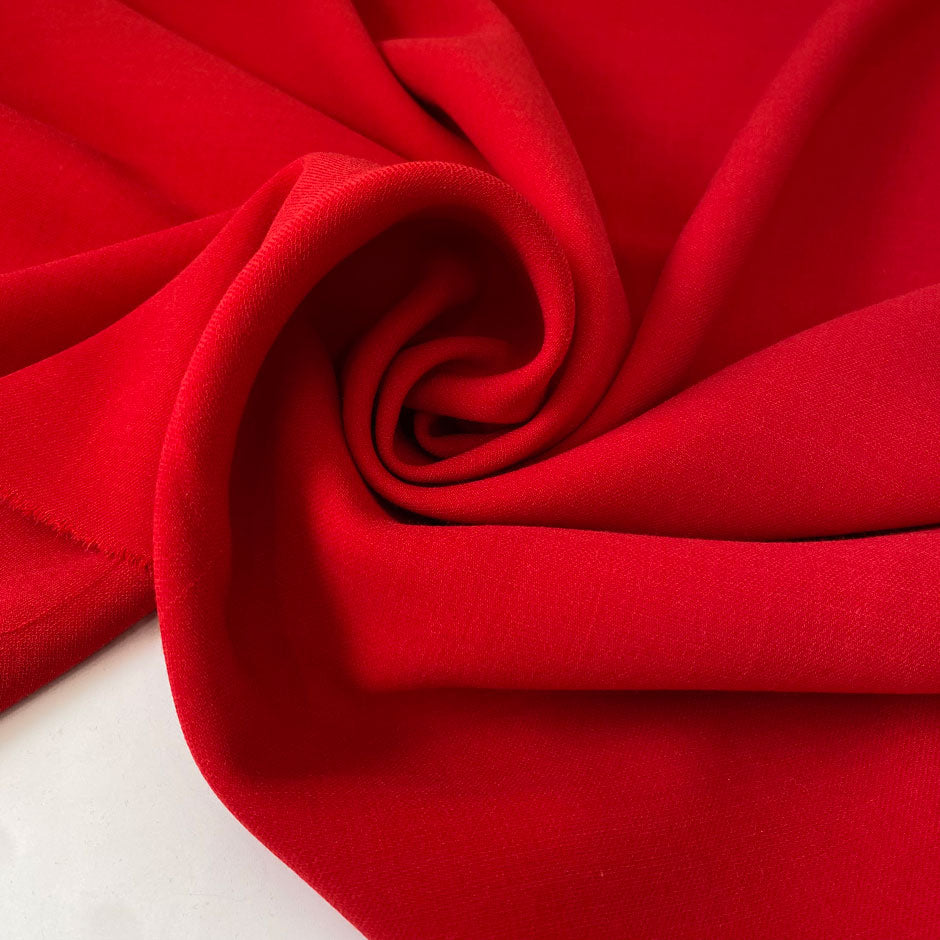 Heavy yet soft wool double crêpe in rich red. Ideal for light coats, jackets, dresses, and skirts.
High-quality deadstock collected in Stock from a Maison de Couture in Italy.