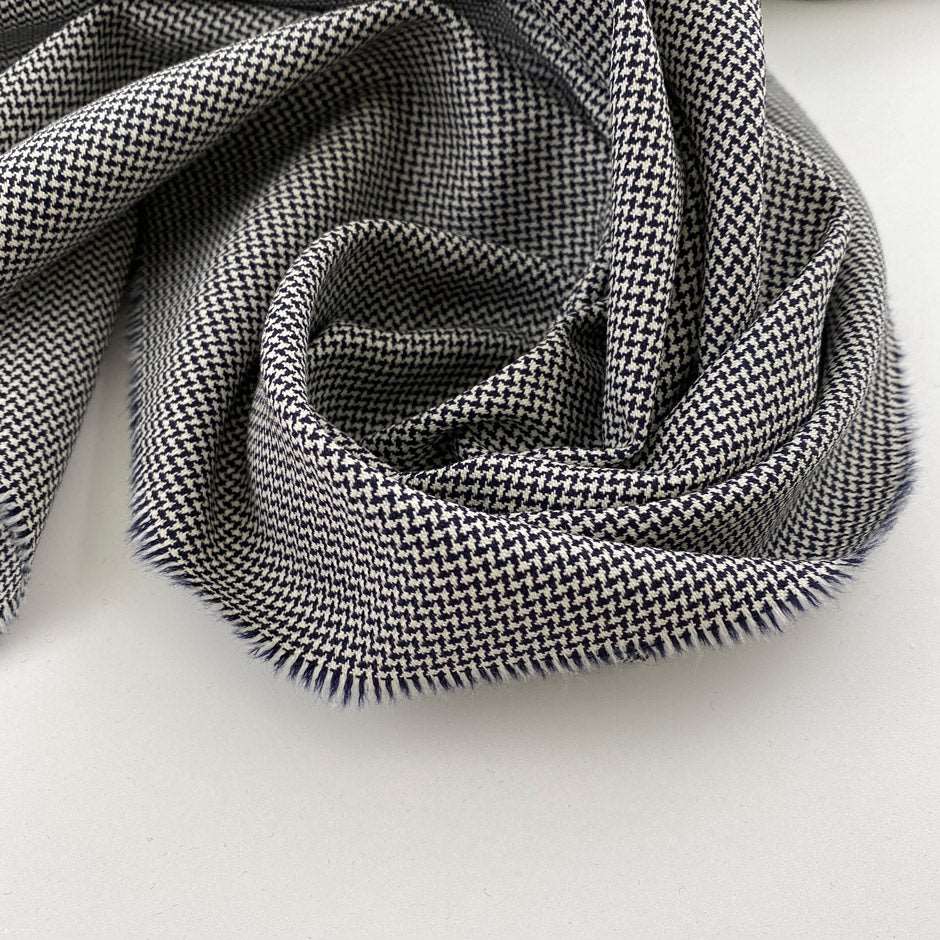 Soft and grey wool jacquard. High quality deadstock fabric.