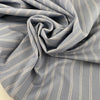 Blue pinstripe pure wool. High-quality deadstock fabric collected in Stock from a Maison de Couture in Italy.