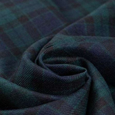 Dark and falling pure watch wool tartan. High-quality deadstock fabric collected in Stock from a Maison de Couture in Italy.
