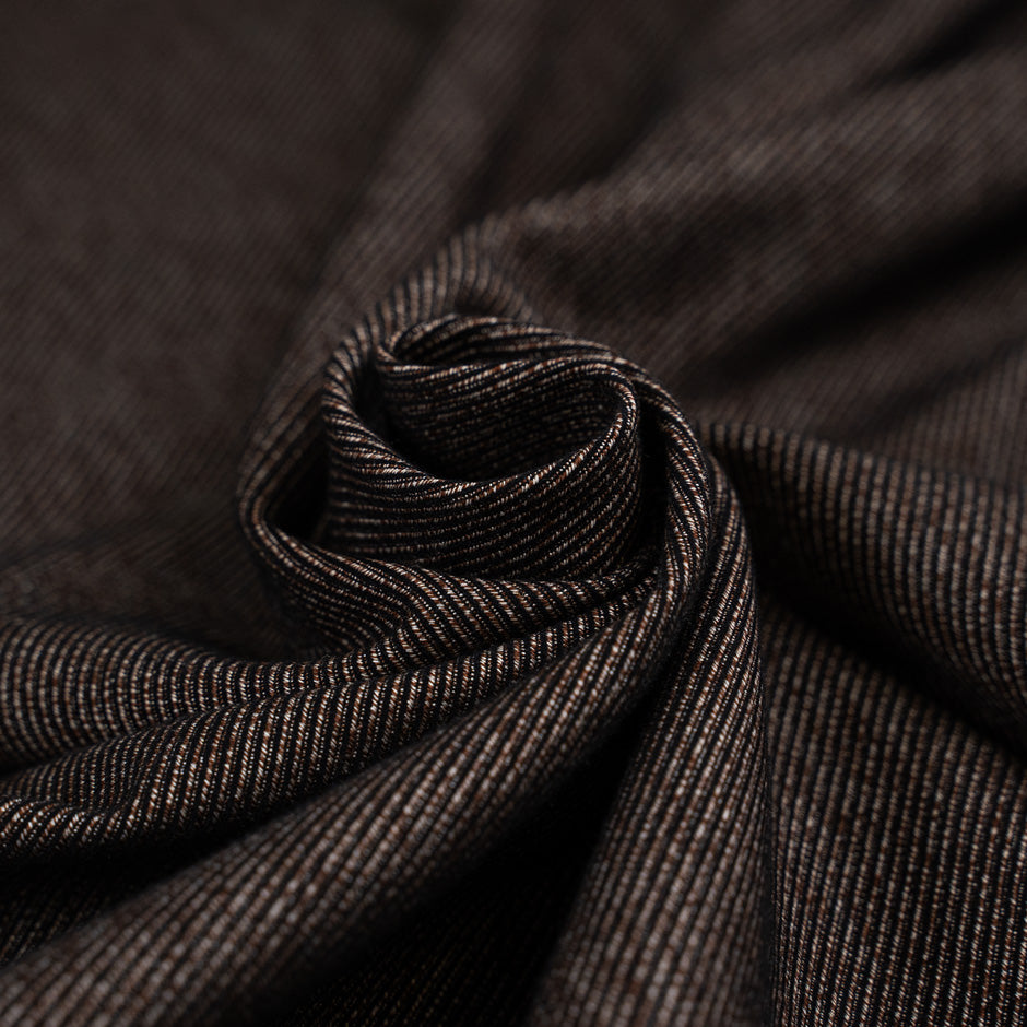 Cavalry brown twill of viscose and polyester with gabardine weave. High-quality deadstock fabric collected in Stock from a Maison de Couture in Italy.