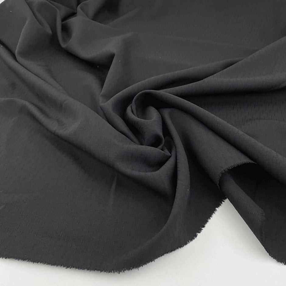 Irregular weave dry wool jacquard