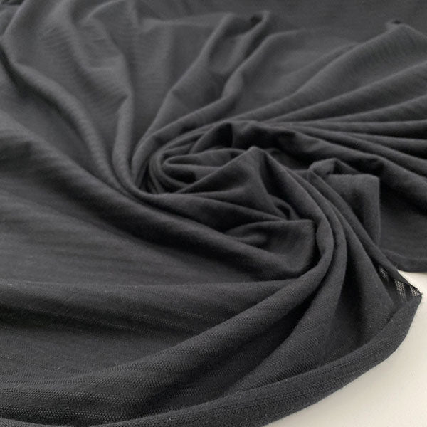 Elasticized cotton jersey worked dyed on dyed